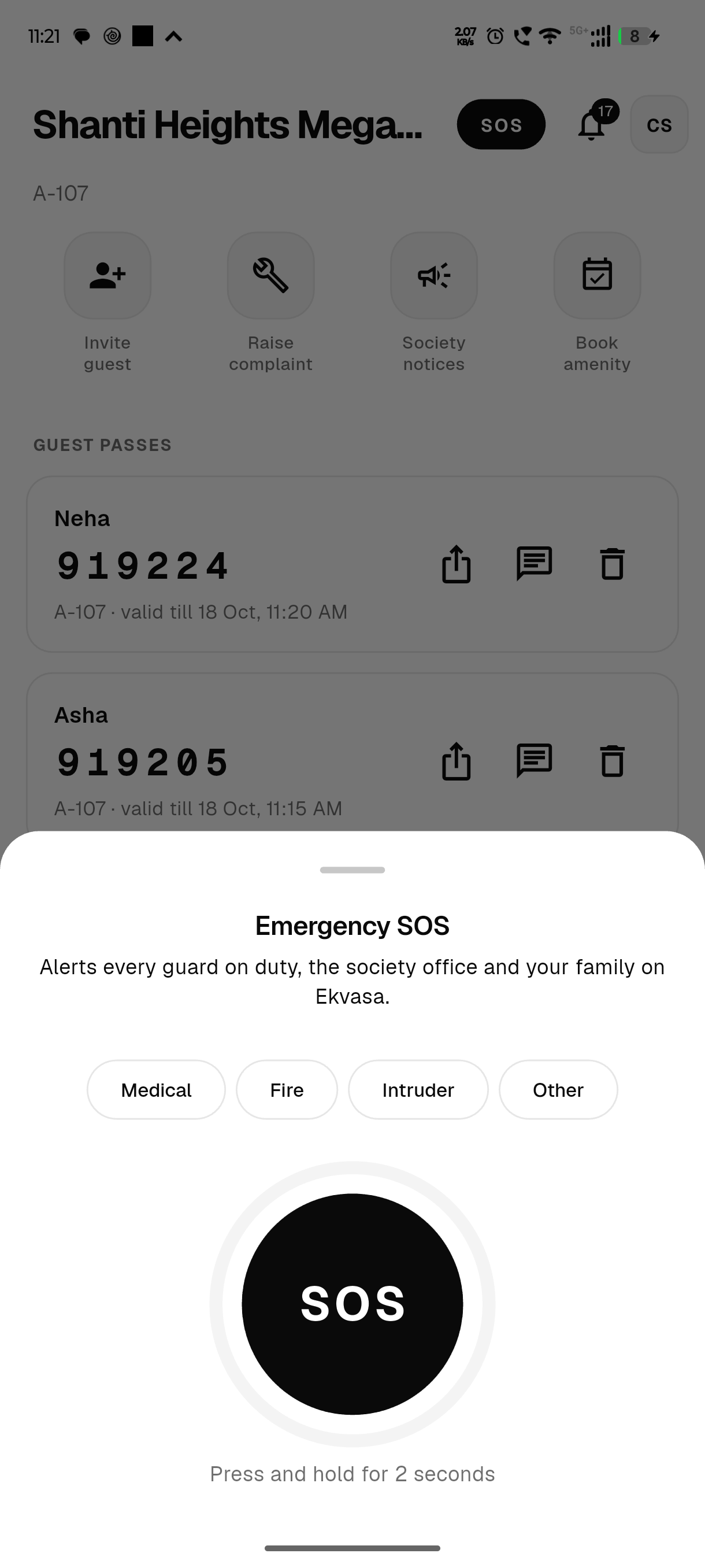 The SOS screen with a large button to hold